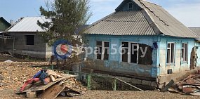 Разрушенный паводком дом. Фото из архива