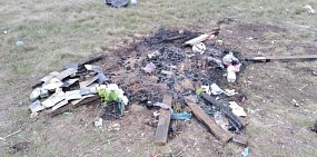 В Переволоцком районе неизвестные сожгли 20 деревянных крестов, украденных на кладбище